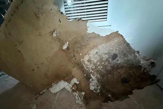 Wall damage before mold removal service in Central Florida